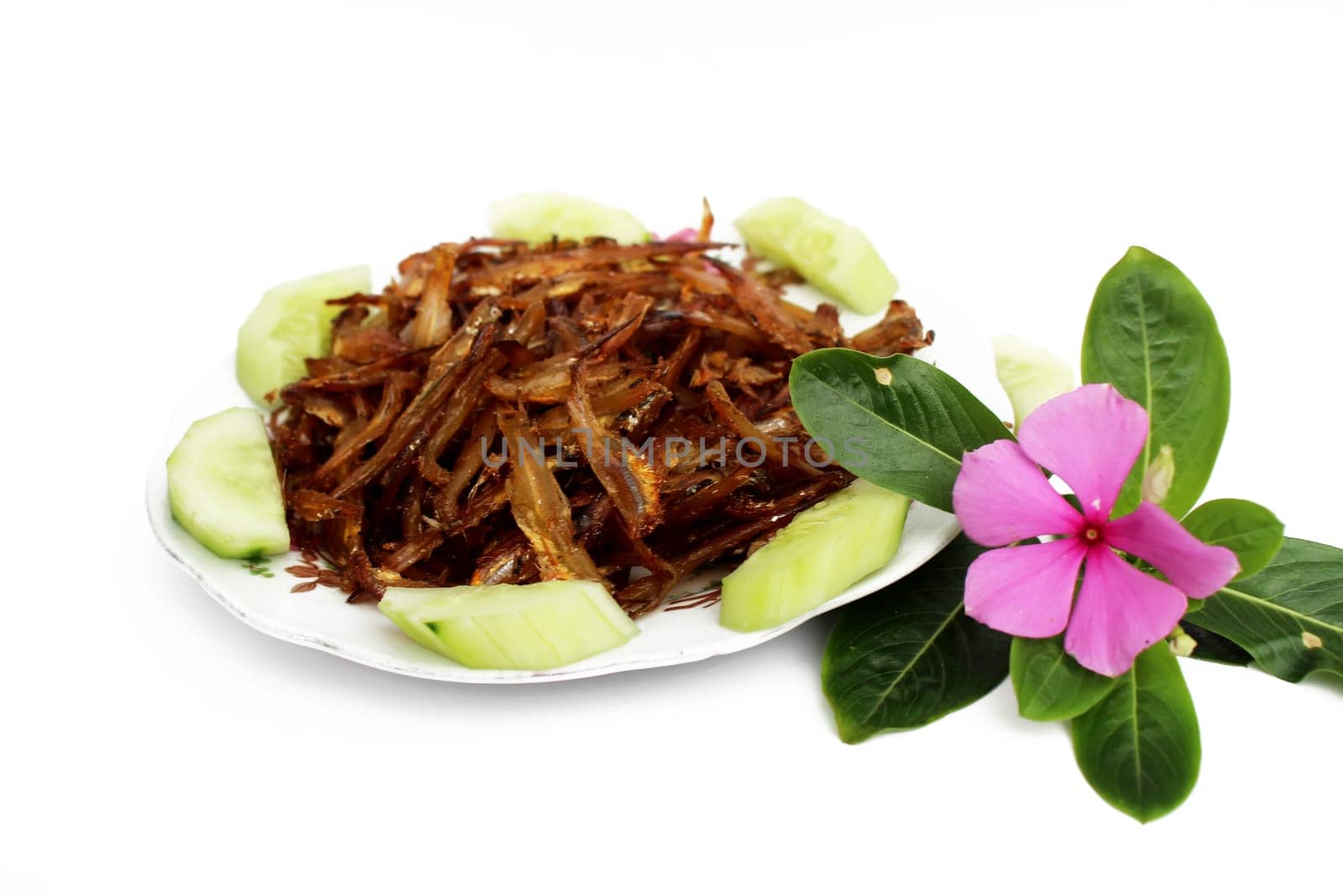 Fried fish  on white dish  in the lunch of Vietnam