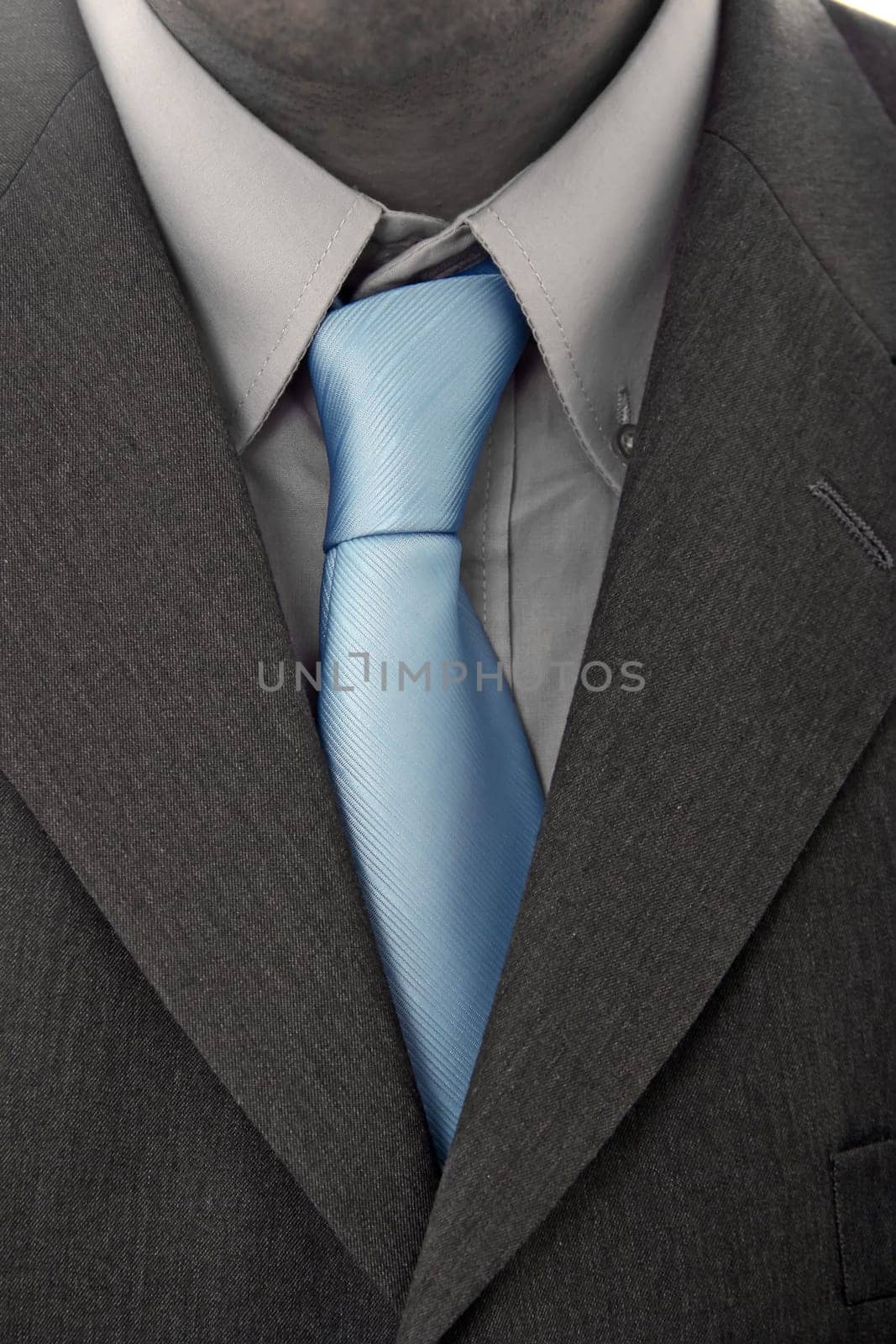 detail of a Business man Suit with blue tie