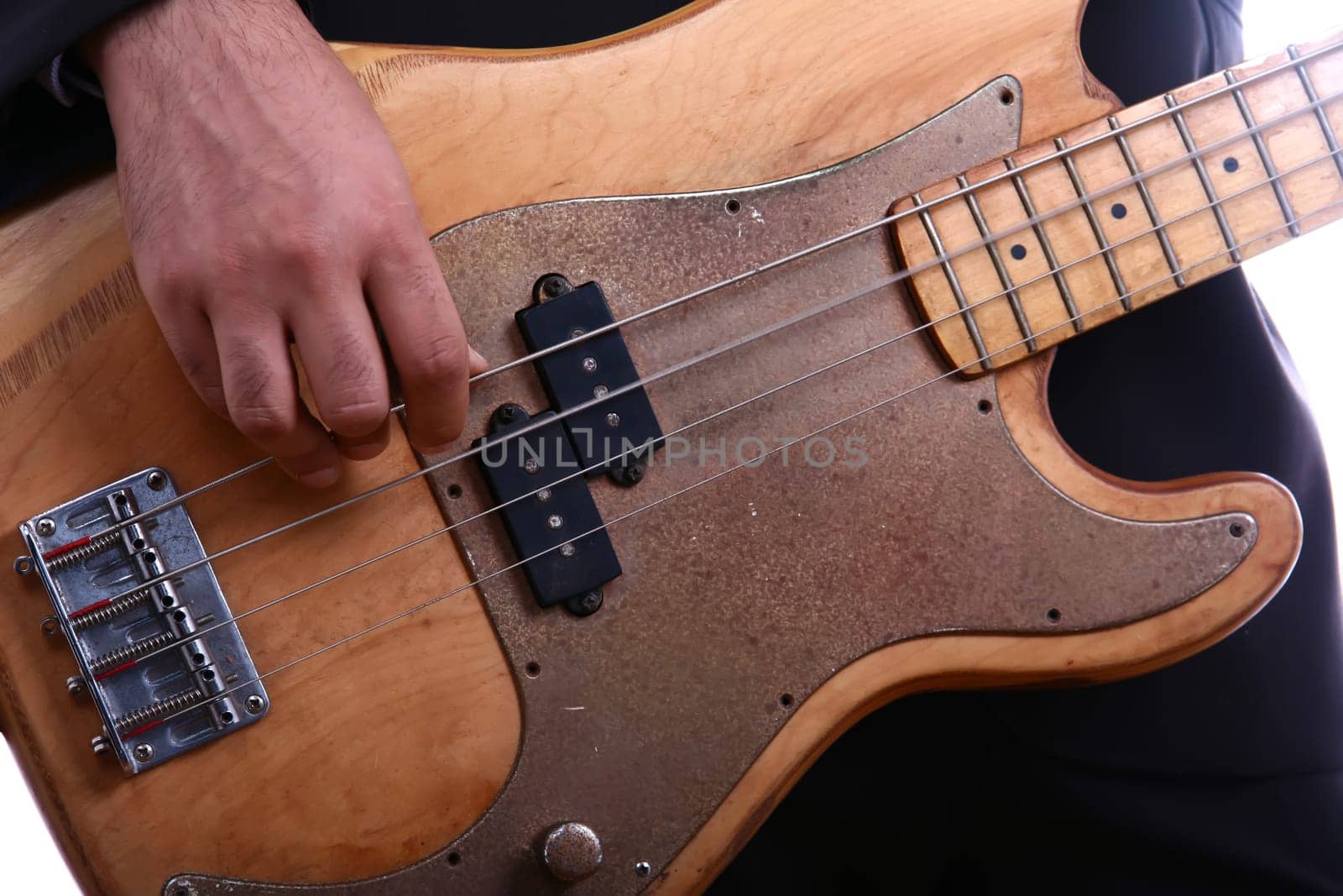 an playing electrical guitar