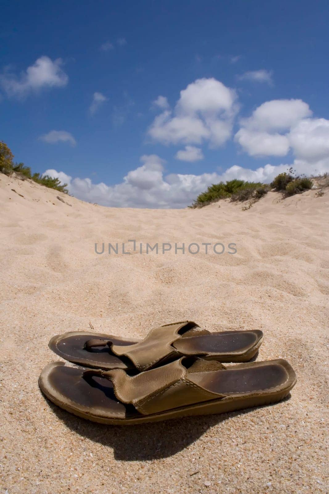 Old sandals at the beach