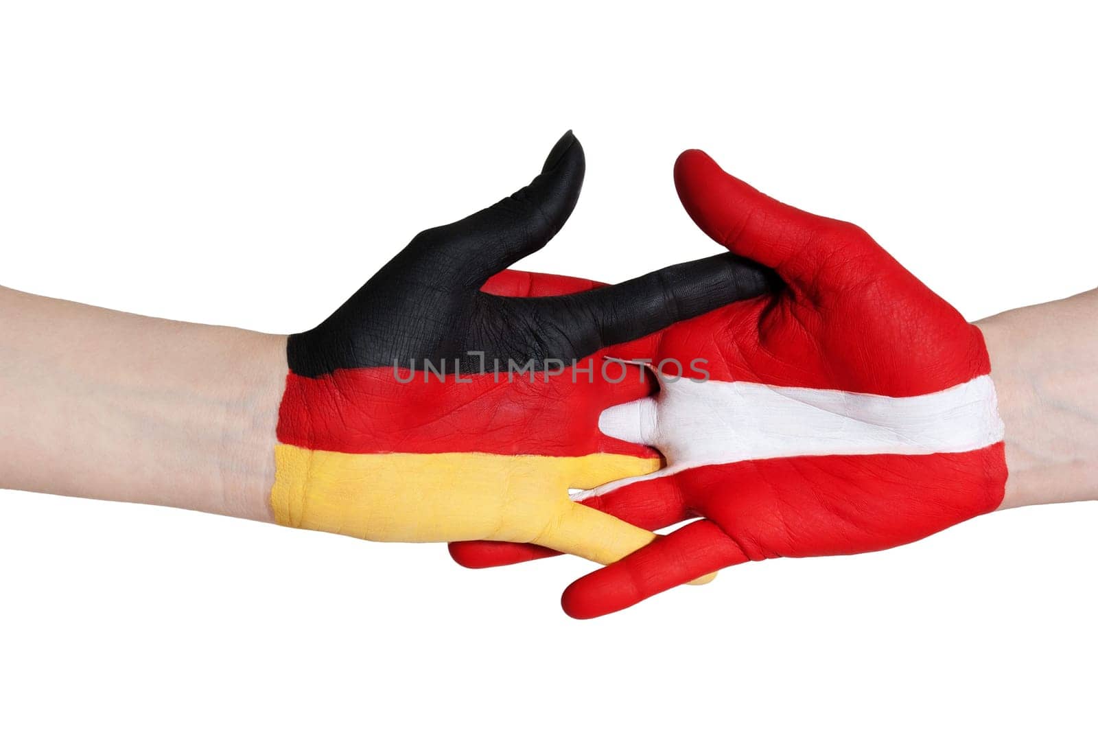 two painted hands symbolizing germany and austria in coalition, isolated