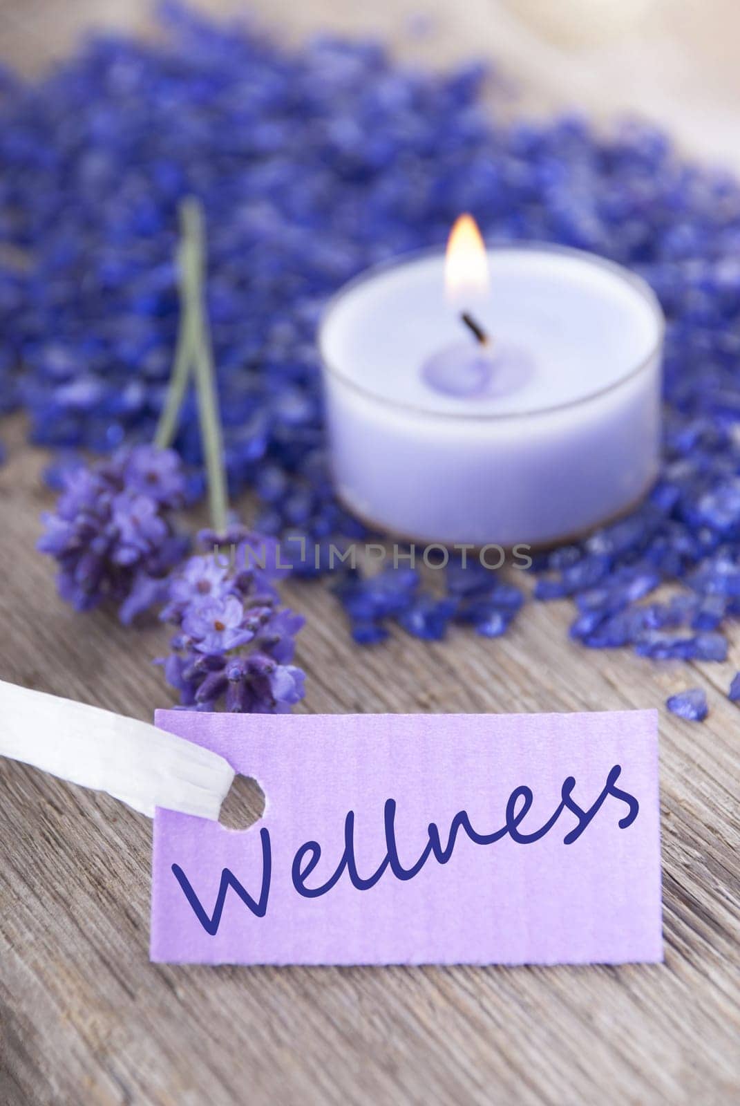 a wellness background with purple label on which stands wellness