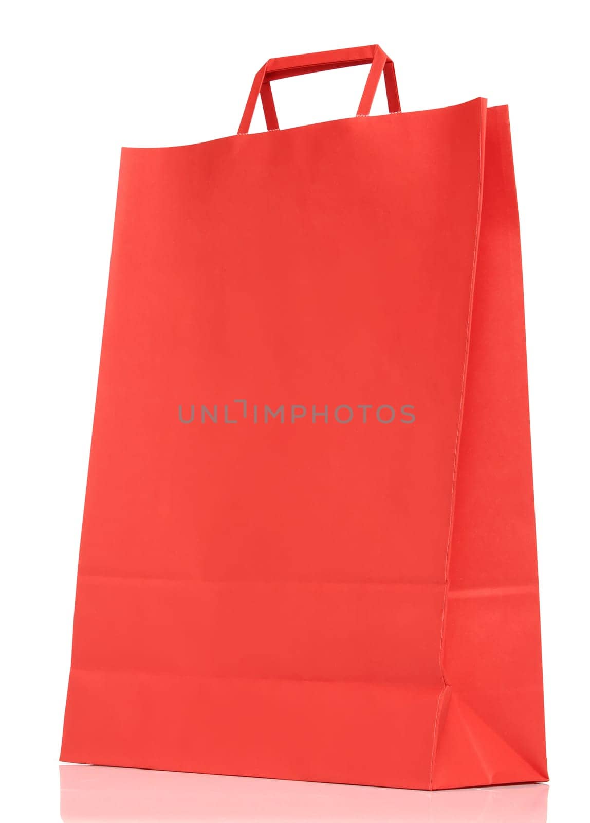 Red paper shopping bag isolated on white background