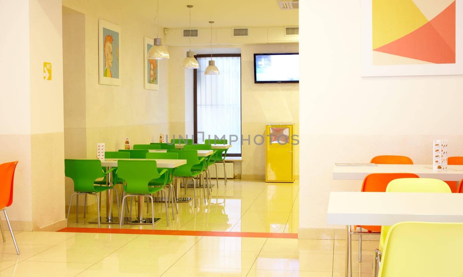 Interior of a yellow fast food restaurant