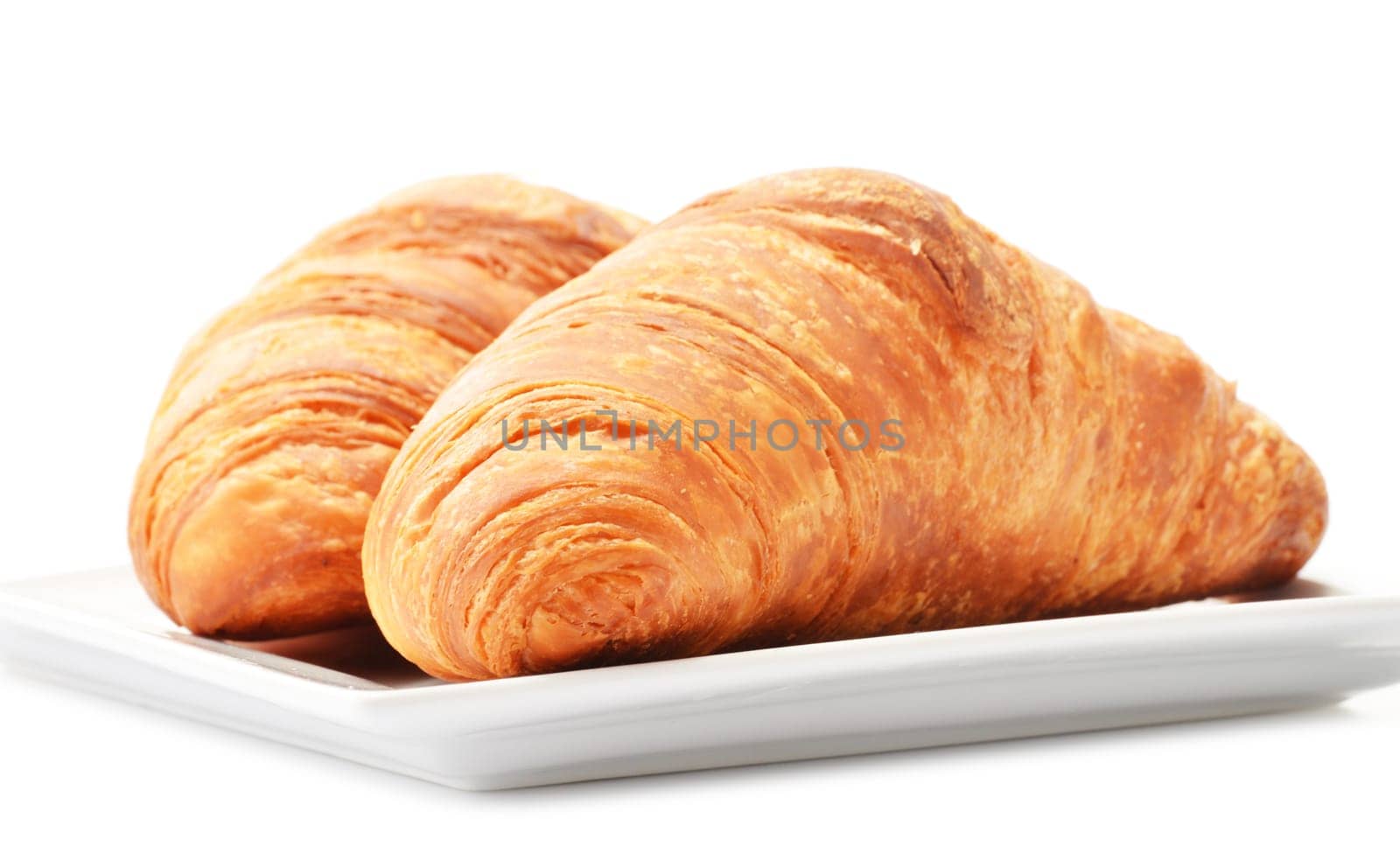 Fresh croissants isolated on white background