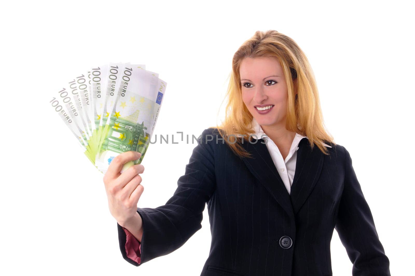 Attractive young woman with long blond hair in a business outfit isolated against a white background.