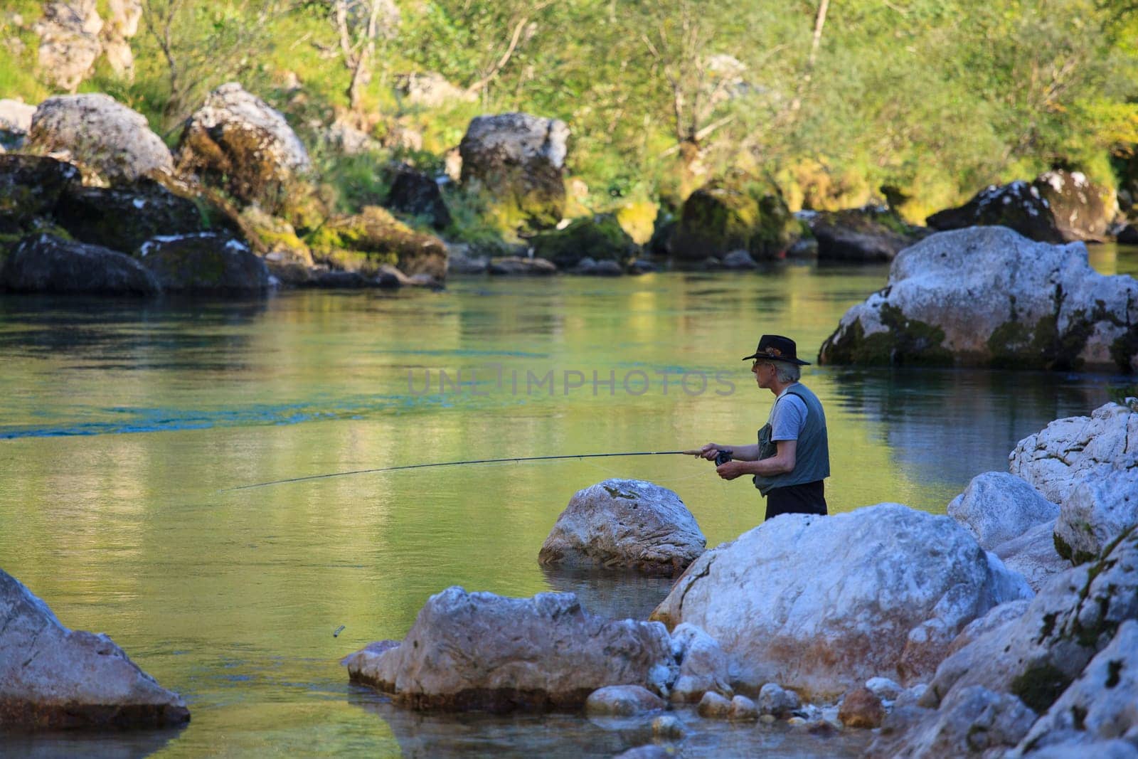 Photo of a Fisherman in the Soca river, Slovenia