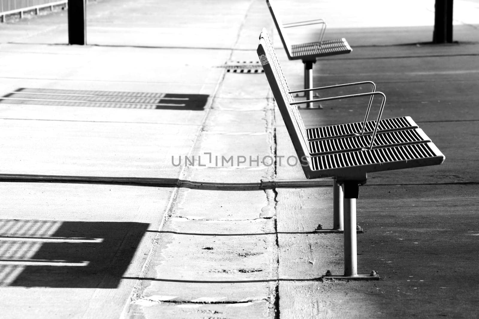 The monochrome photograph of a lattice iron bank.