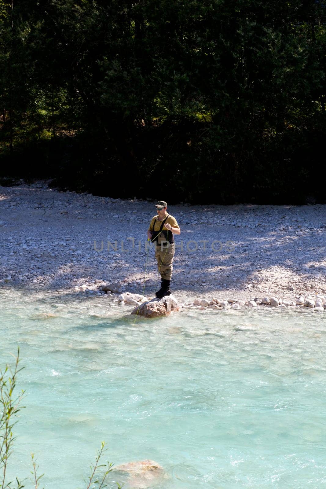 Photo of a Fisherman in the Soca river, Slovenia