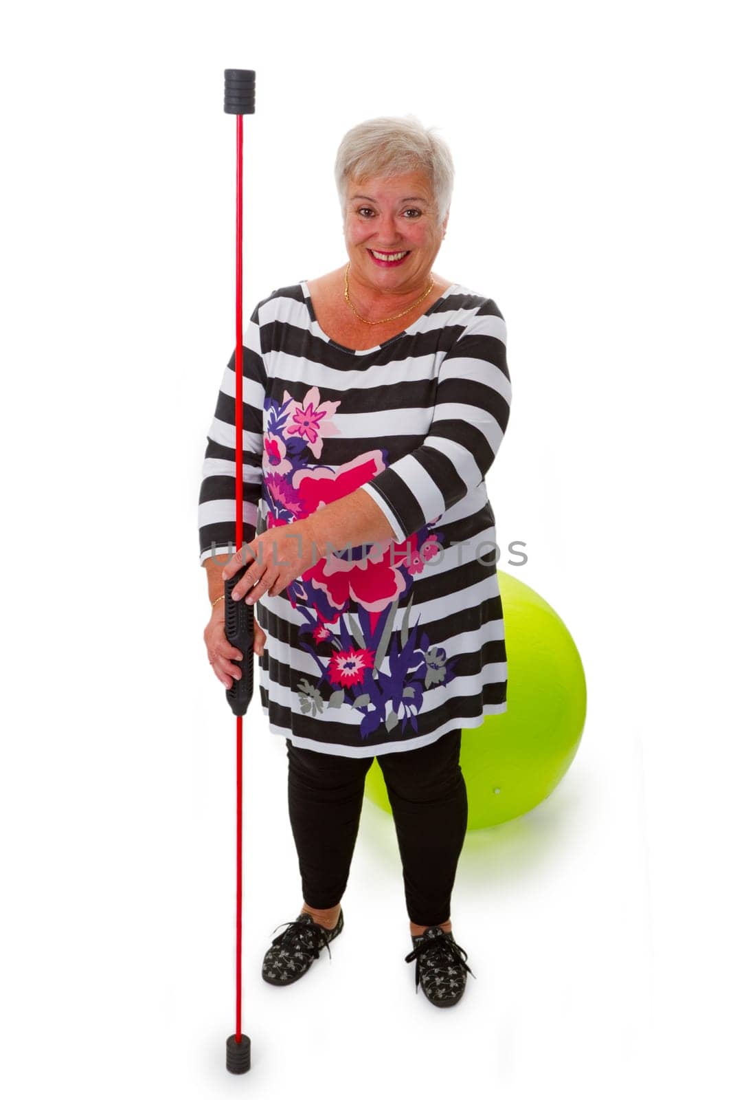 Senior citizen with swinging stick and gymnastics ball - cropped on white background