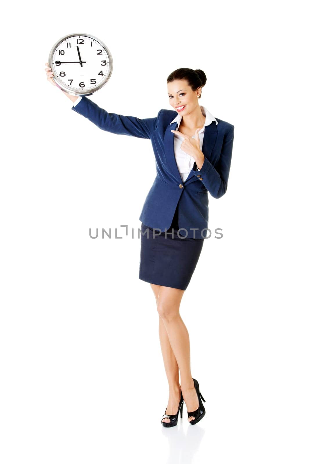 happy young attractive business woman holding office clock,isolated on white background