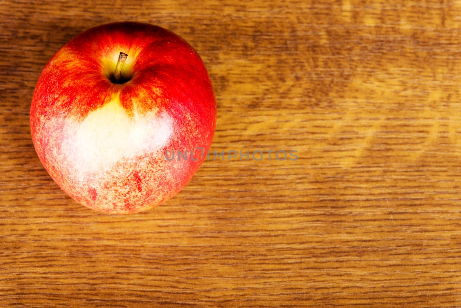 apple on wooden table