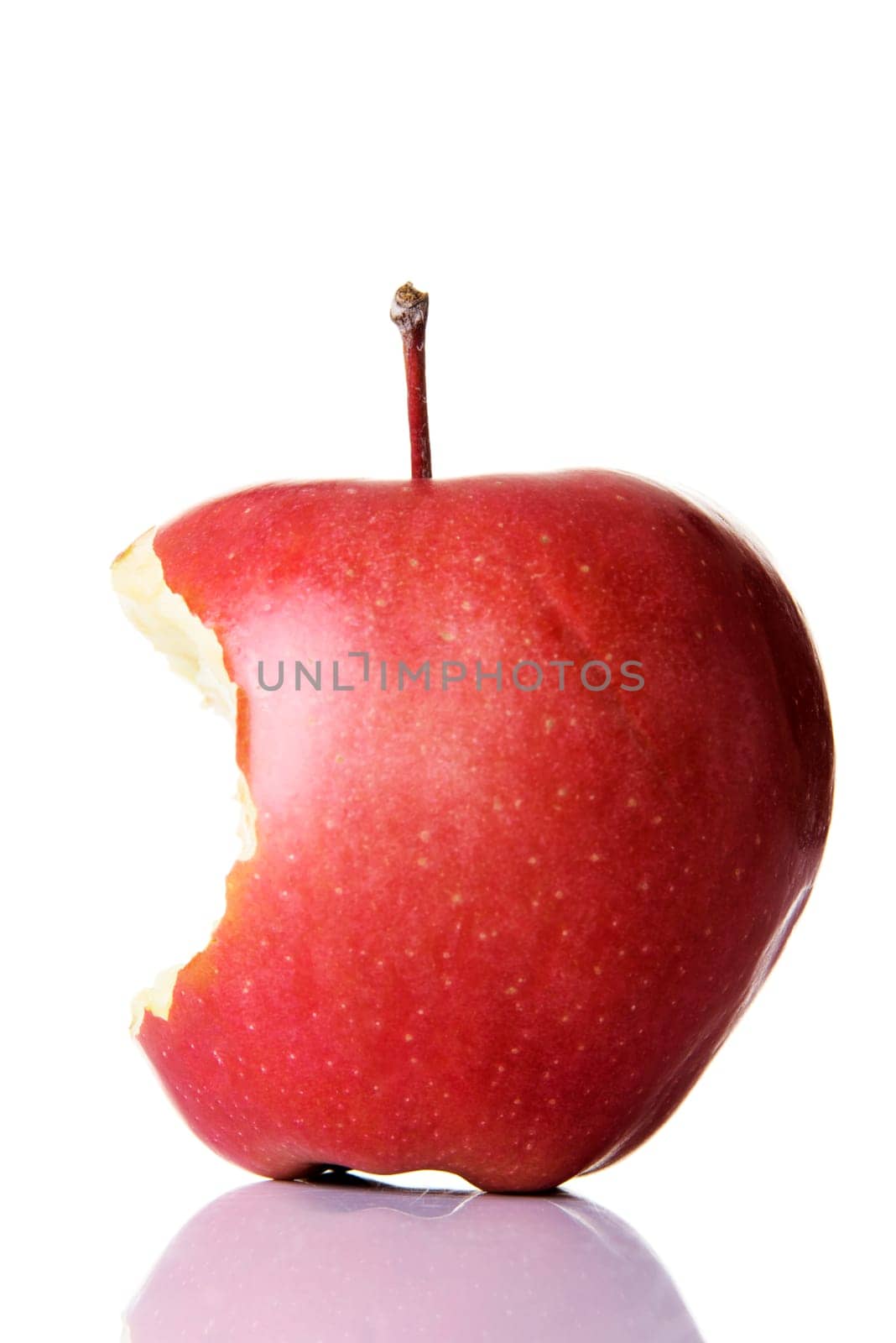 red bitten apple isolated on white