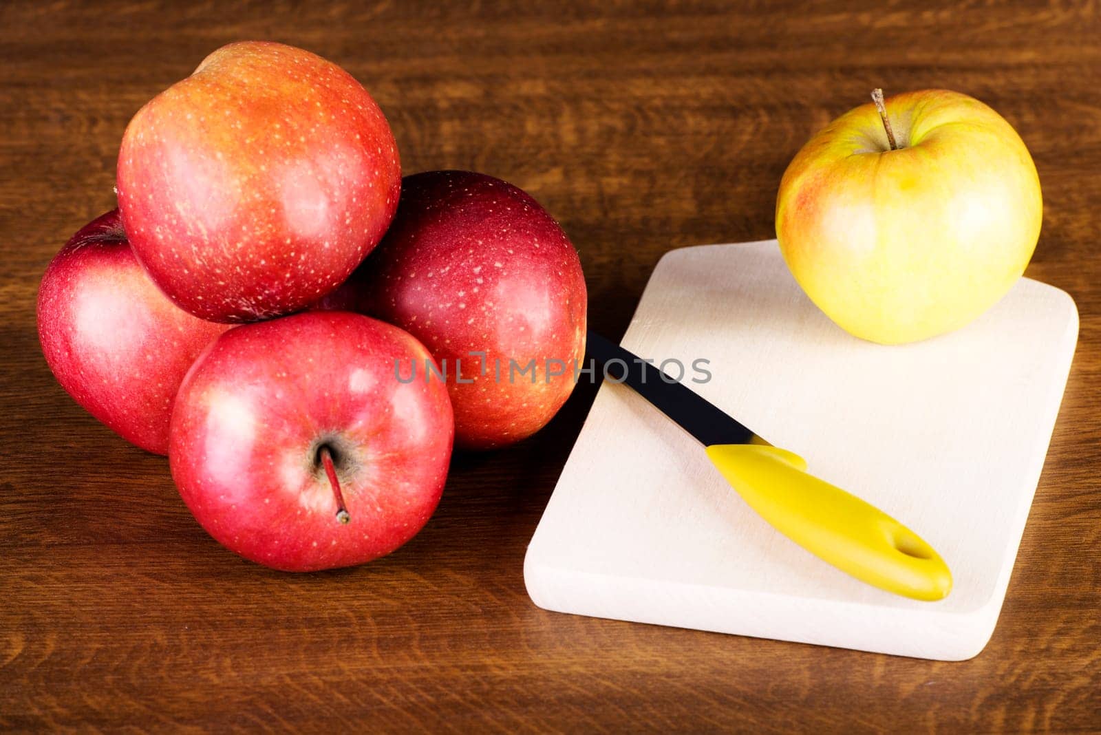 apples on wooden table