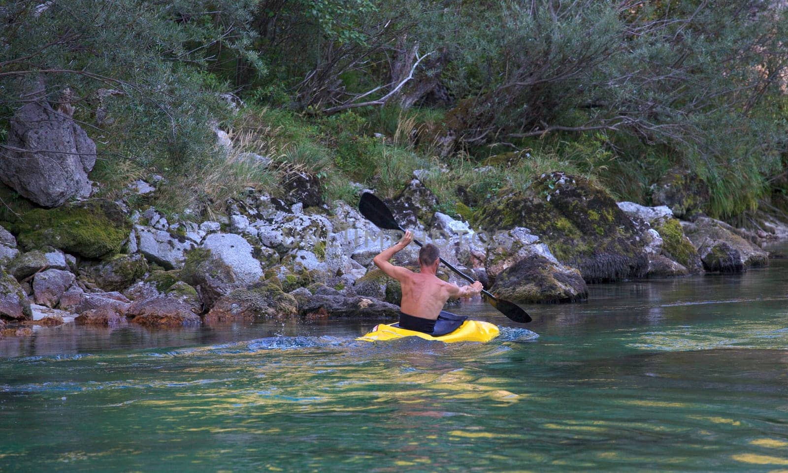 Kayaking in the summer on the Soca river, Slovenia