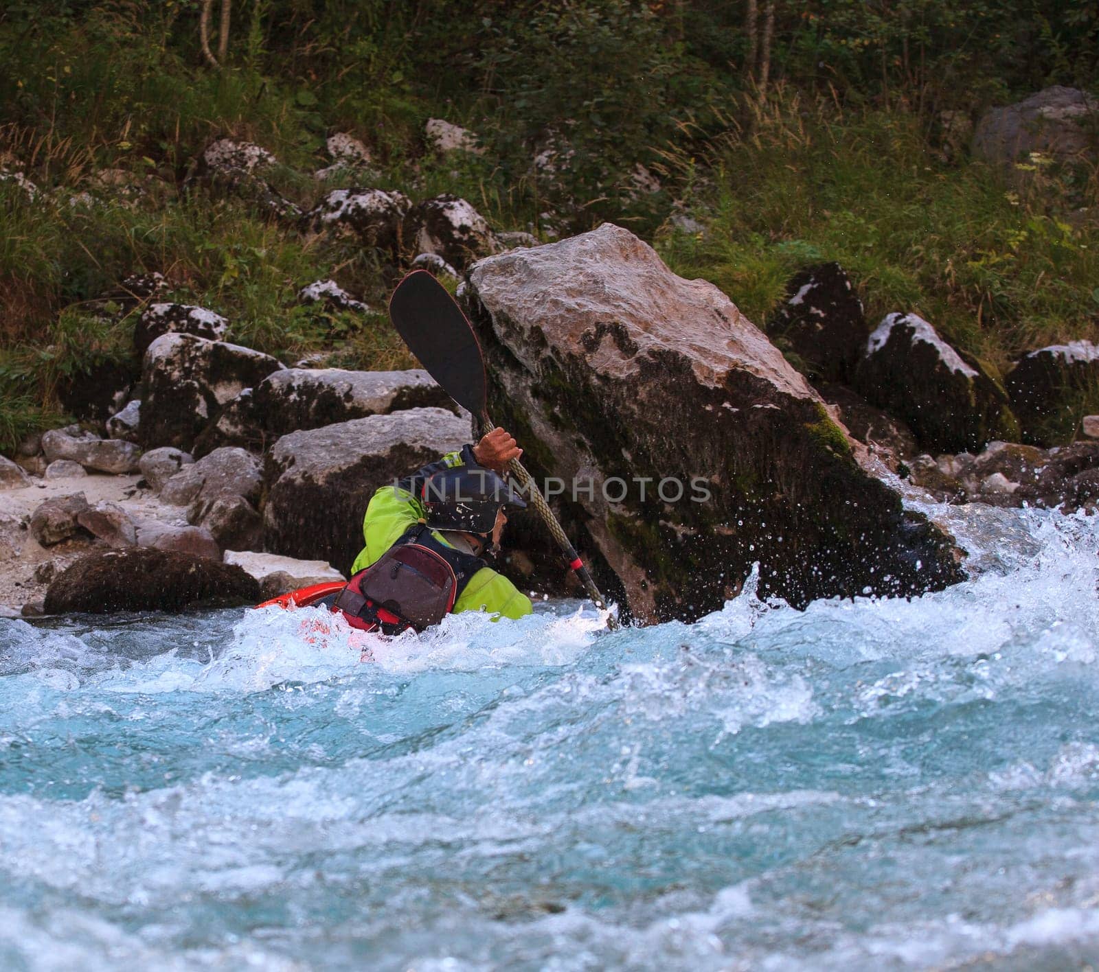 Kayaking in the summer on the Soca river, Slovenia