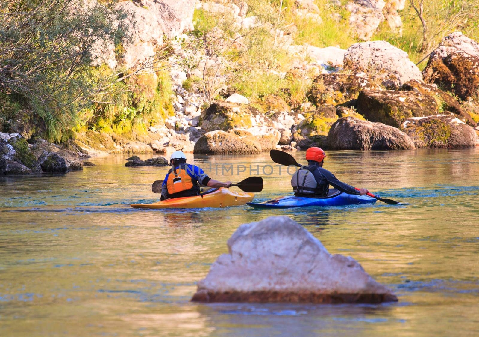 Kayaking in the summer on the Soca river, Slovenia