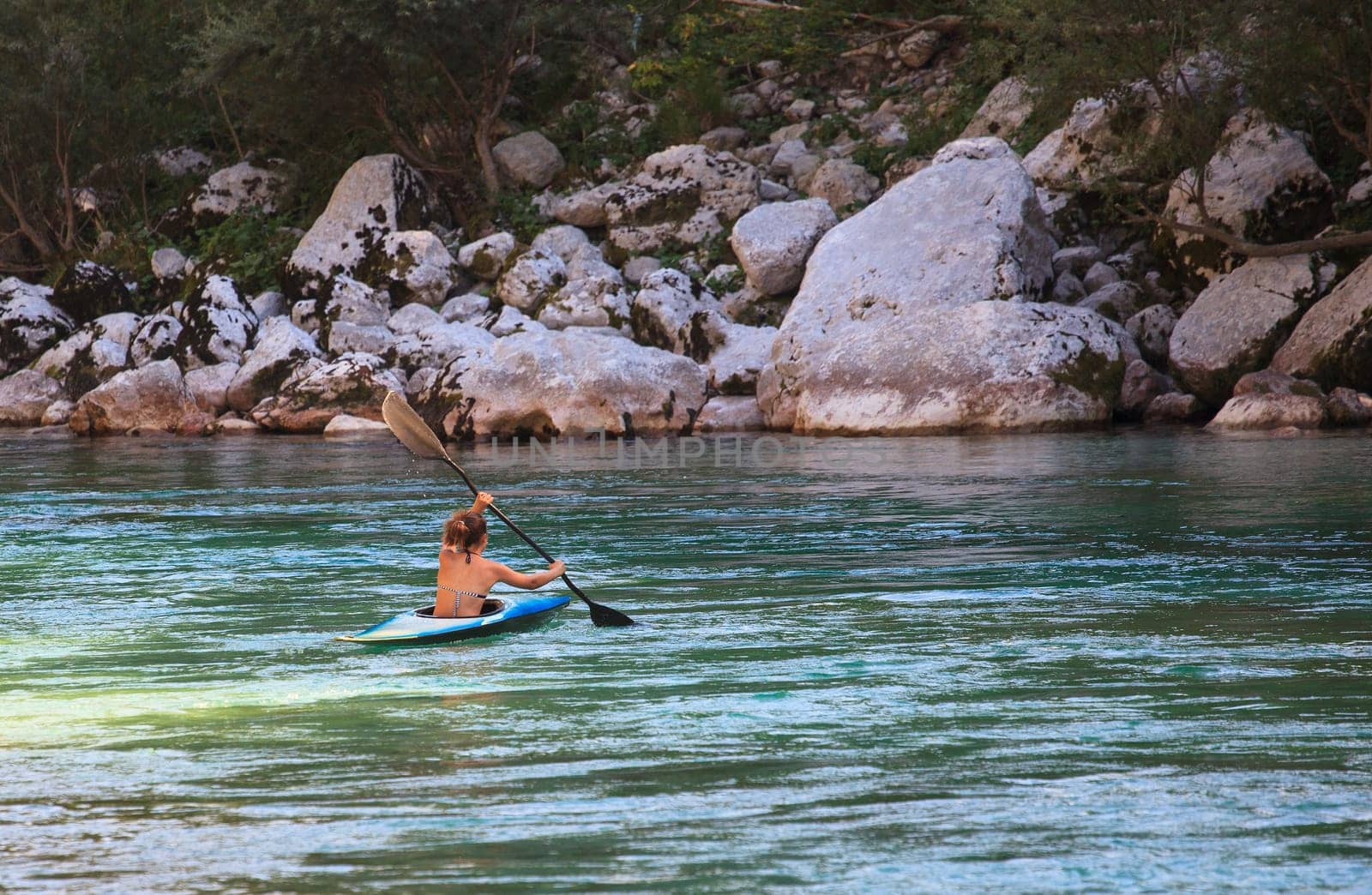 Kayaking in the summer on the Soca river, Slovenia