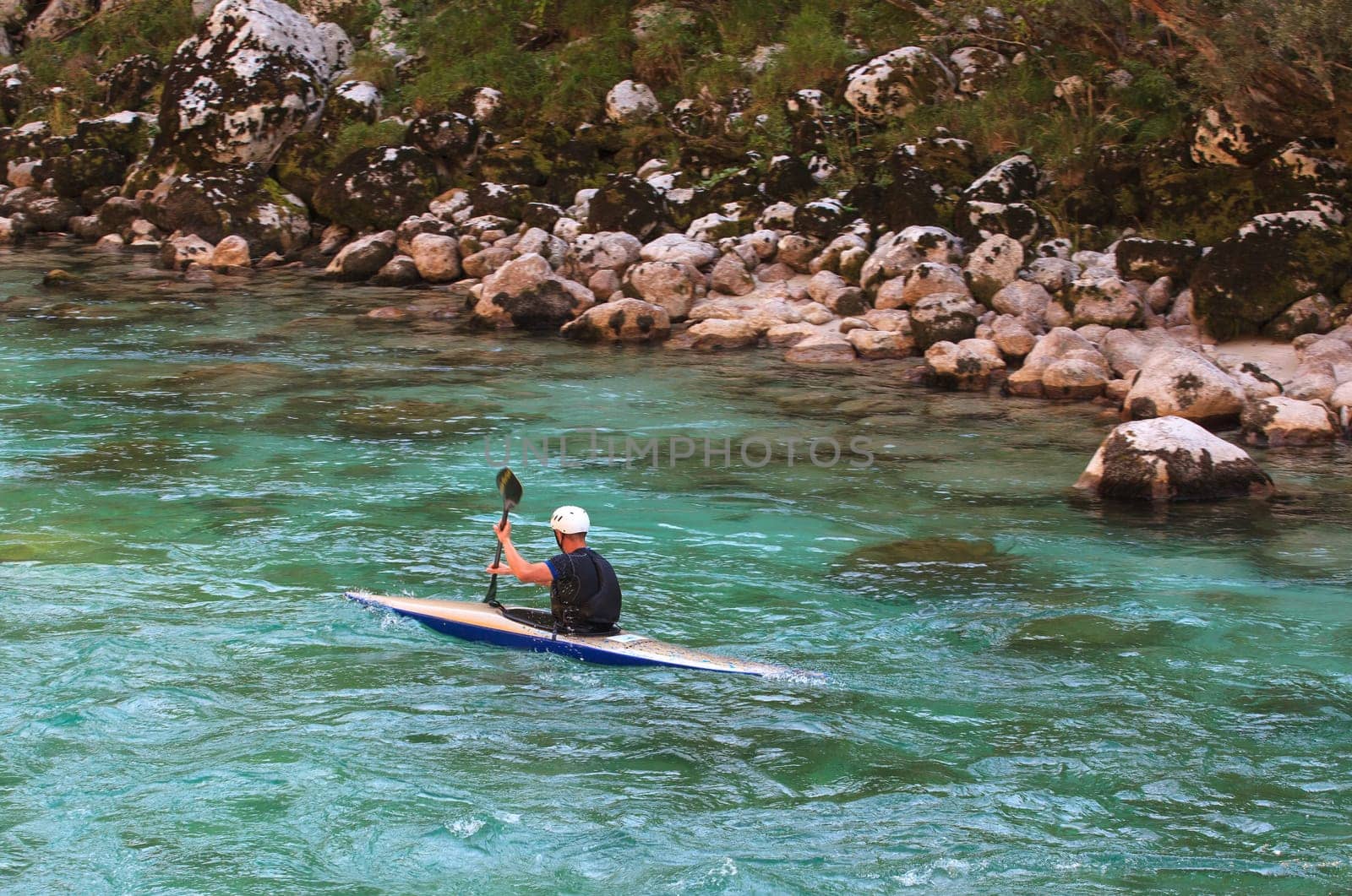 Kayaking in the summer on the Soca river, Slovenia