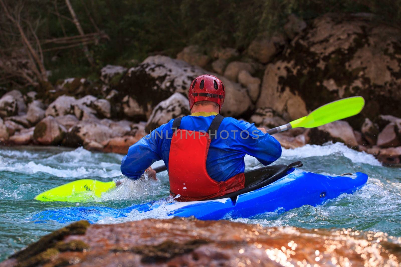 Kayaking in the summer on the Soca river, Slovenia