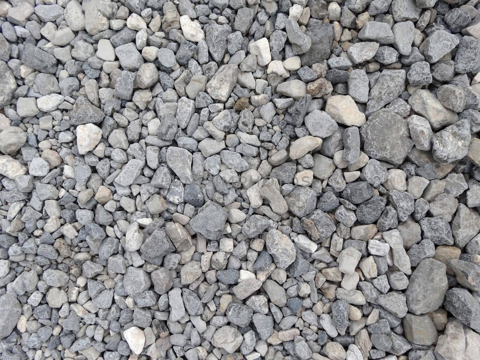 Background of grey small gravel and pebbles