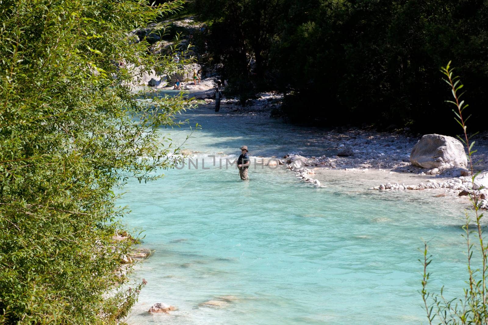 Photo of a Fisherman in the Soca river, Slovenia
