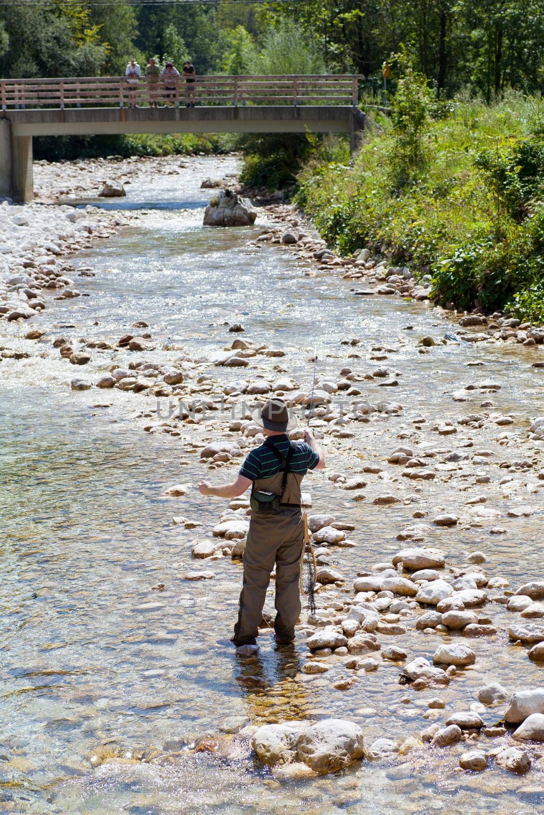 Photo of a Fisherman in the Soca river, Slovenia
