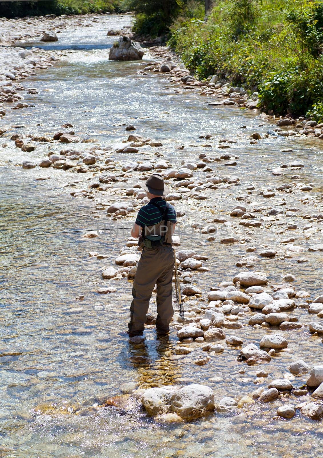 Photo of a Fisherman in the Soca river, Slovenia