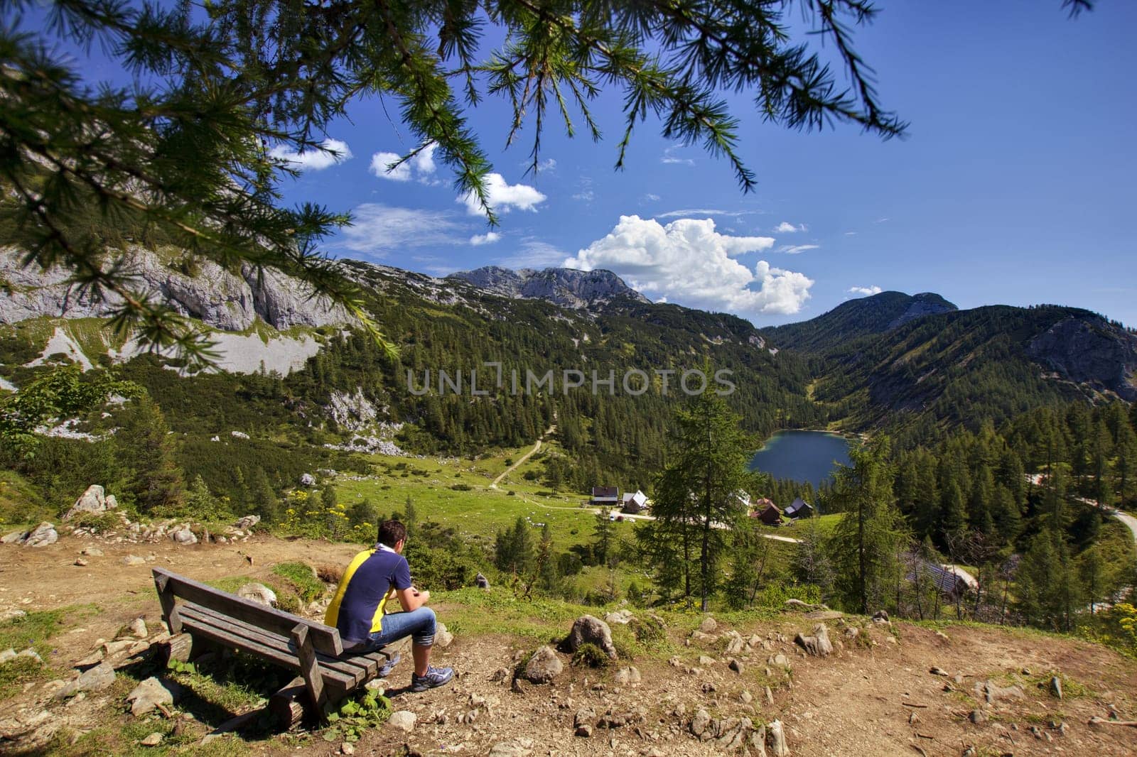 The tourist watching the panorama of the mountains
