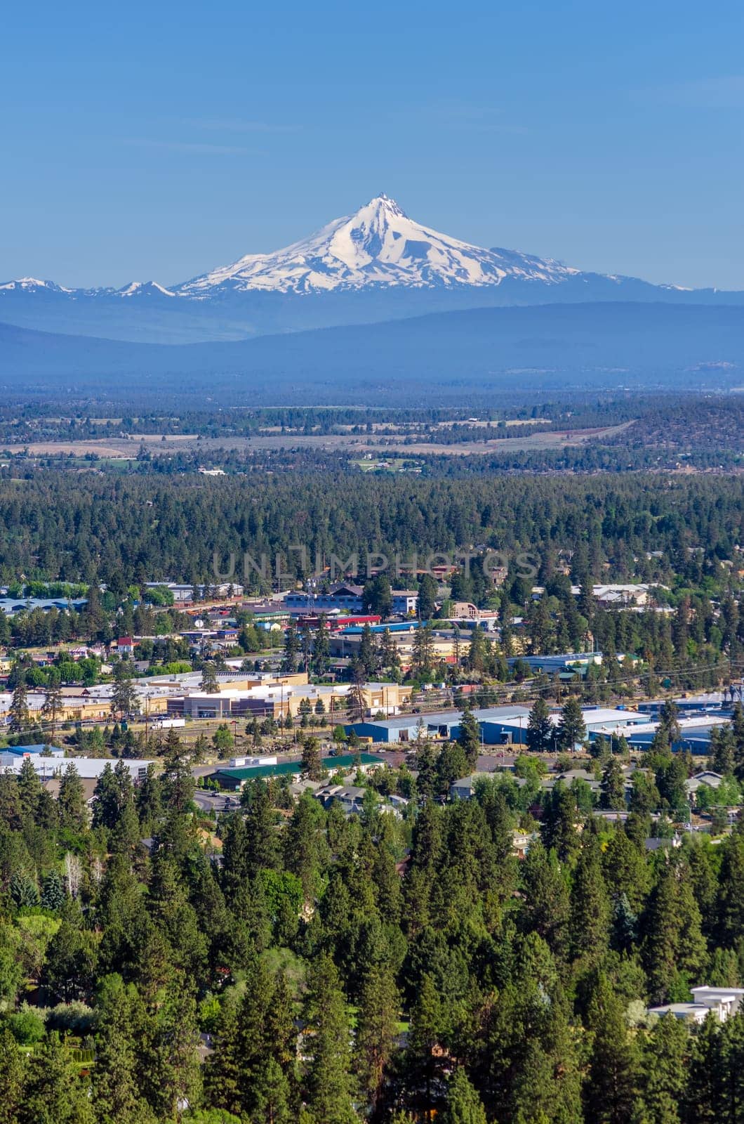 Vertical view of Mount Jefferson and the city of Bend in Central Oregon