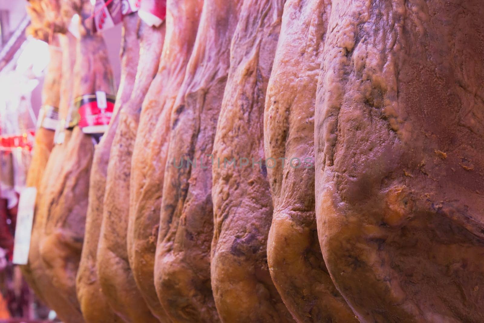 Prosciutto hams ready for sale at the market