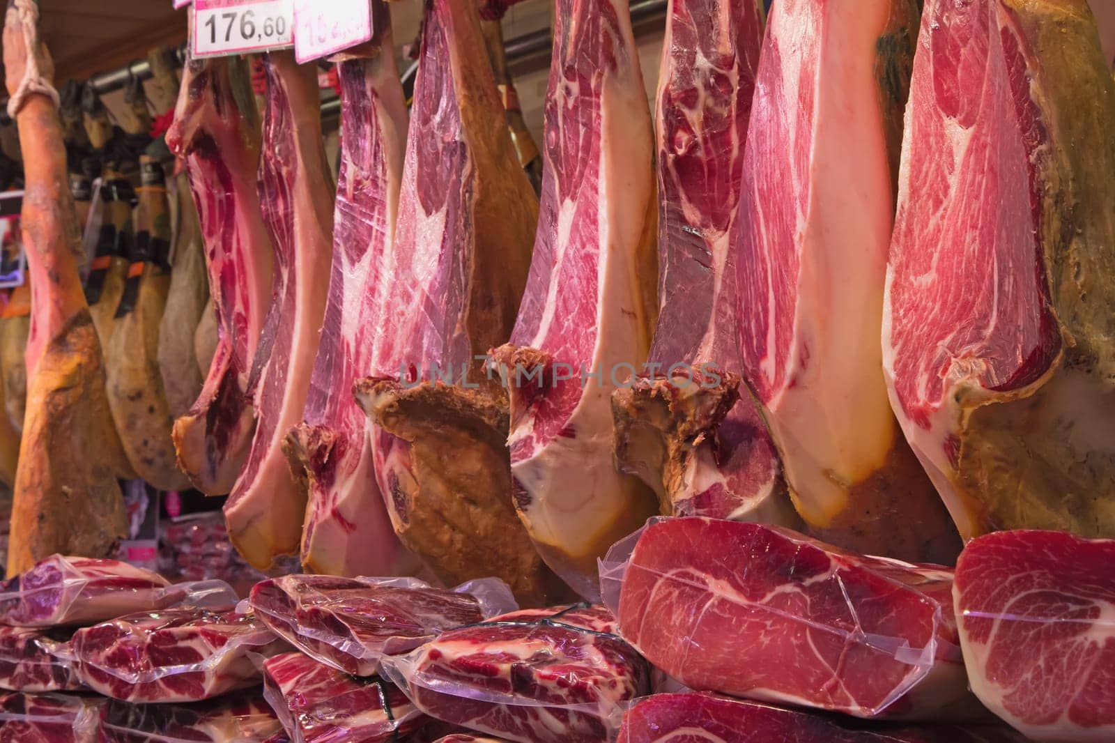 Prosciutto hams ready for sale at the market