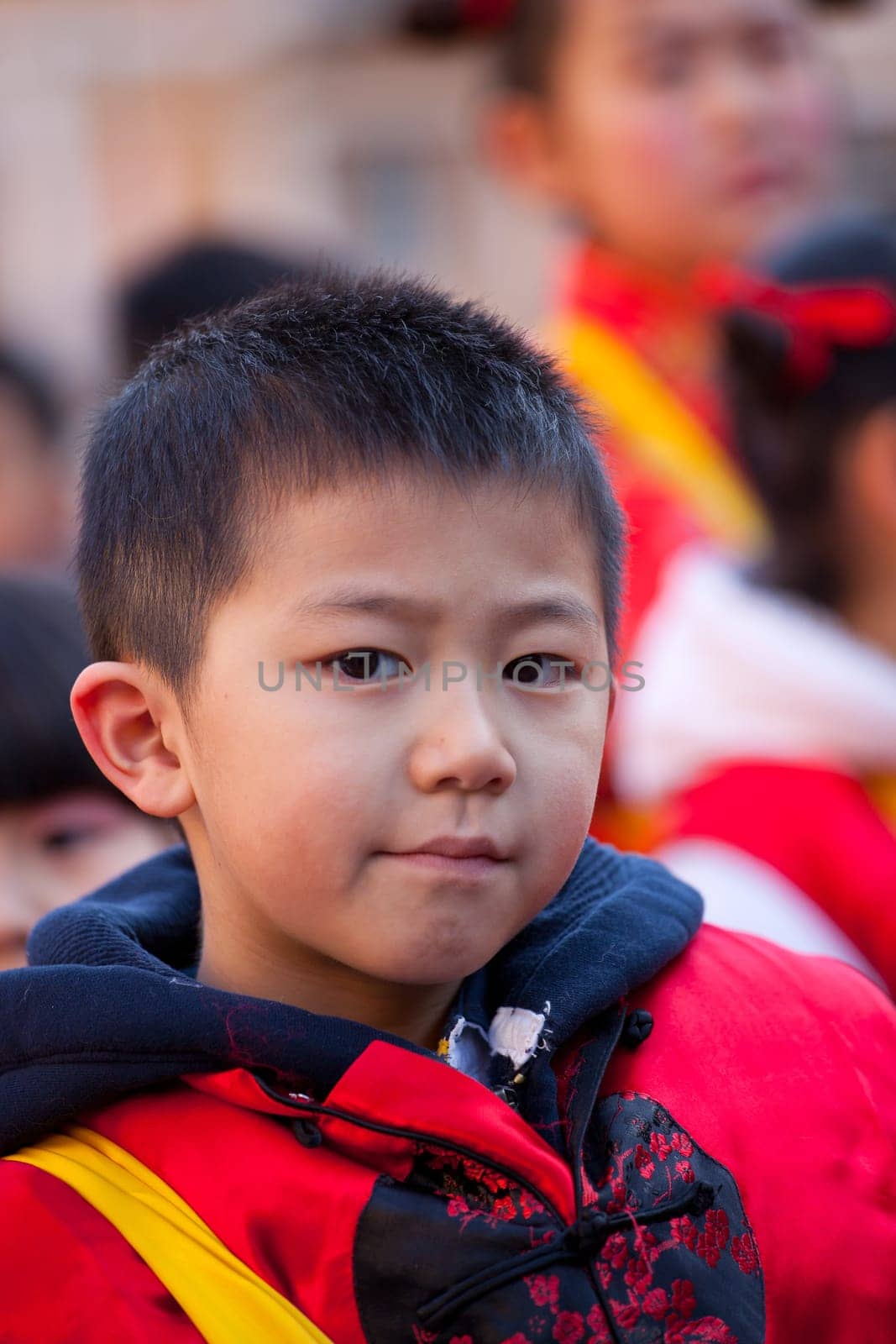 MILAN, ITALY - FEBRUARY 10, 2013: Child during Chinese New Year parade in Milan
