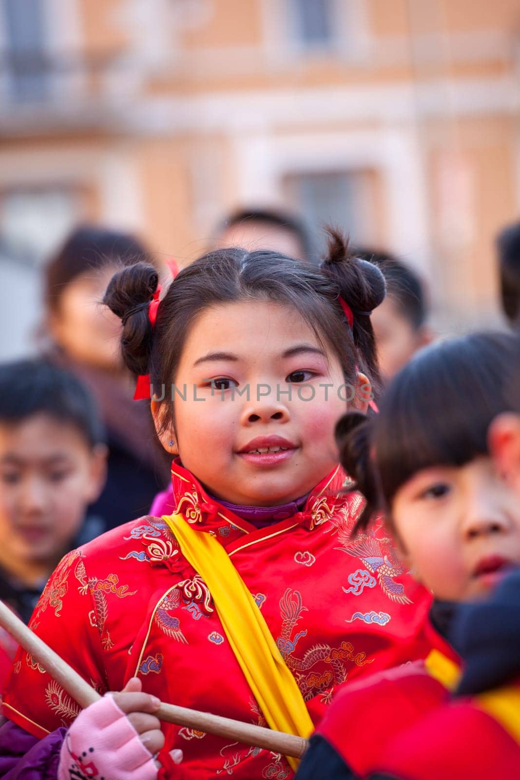 MILAN, ITALY - FEBRUARY 10, 2013: Child during Chinese New Year parade in Milan