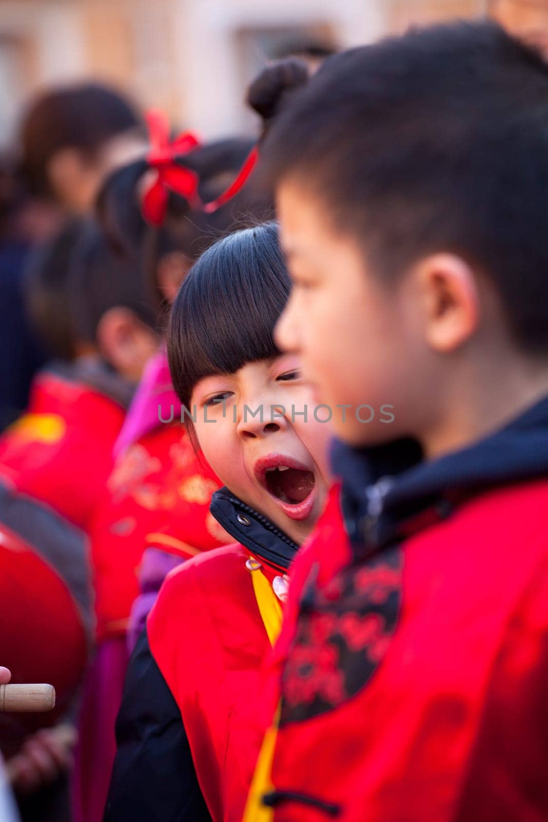 MILAN, ITALY - FEBRUARY 10, 2013: Child during Chinese New Year parade in Milan