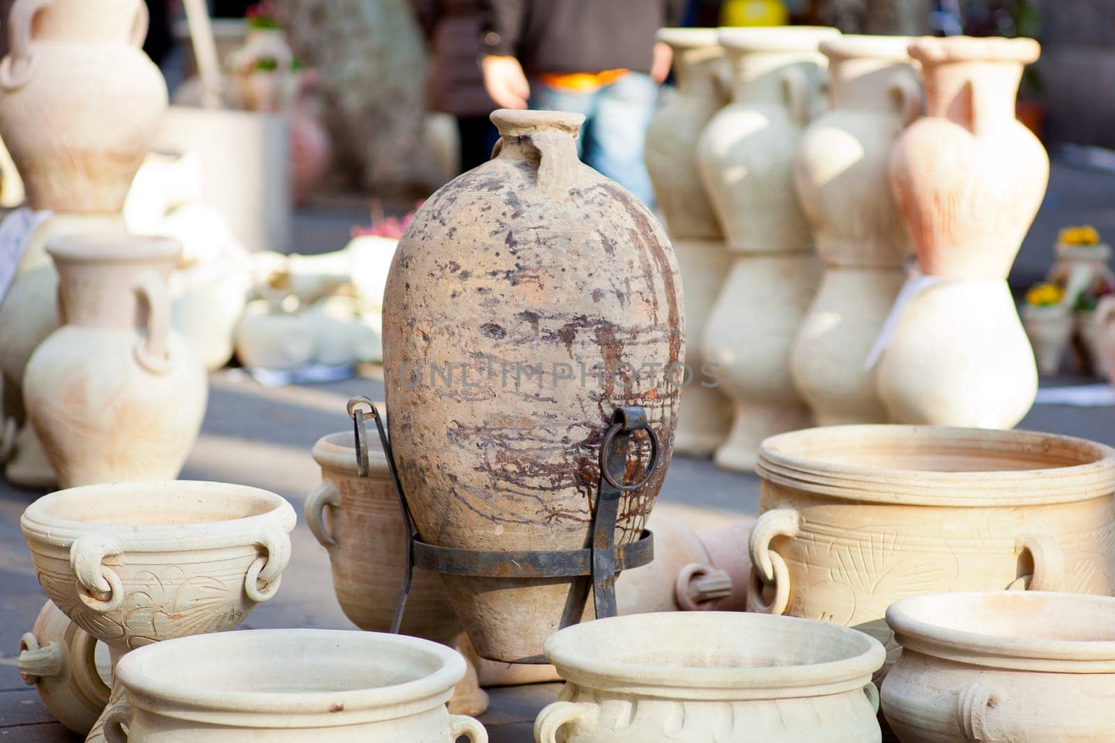A lot of Clay amphoras in the street