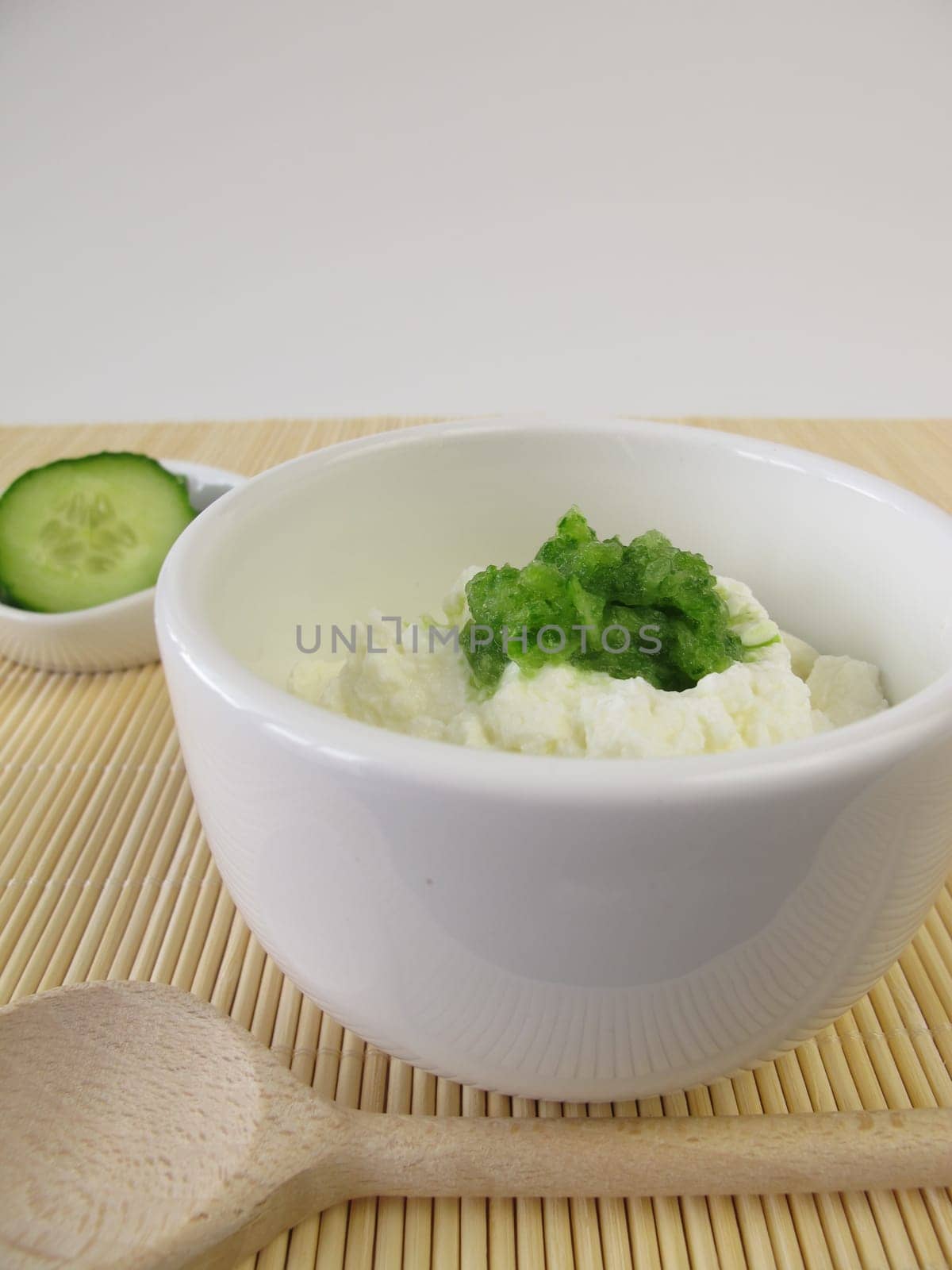 Invigorating face mask with cottage cheese and cucumber