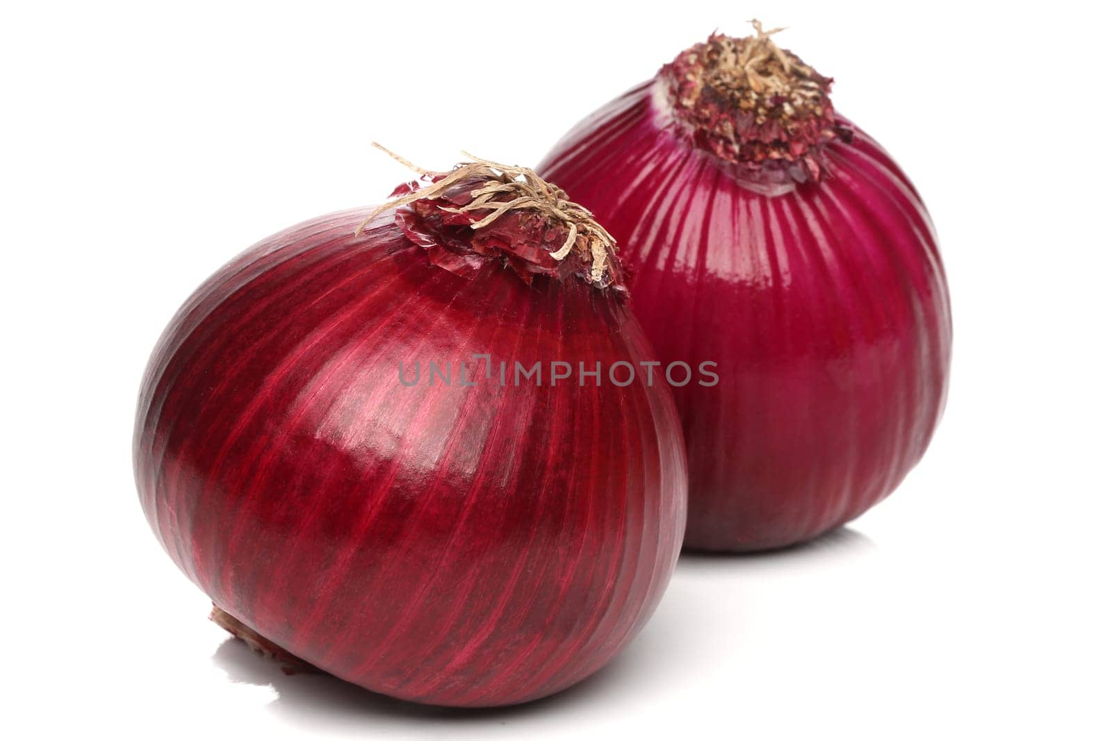 Red onion bulb isolated on white background