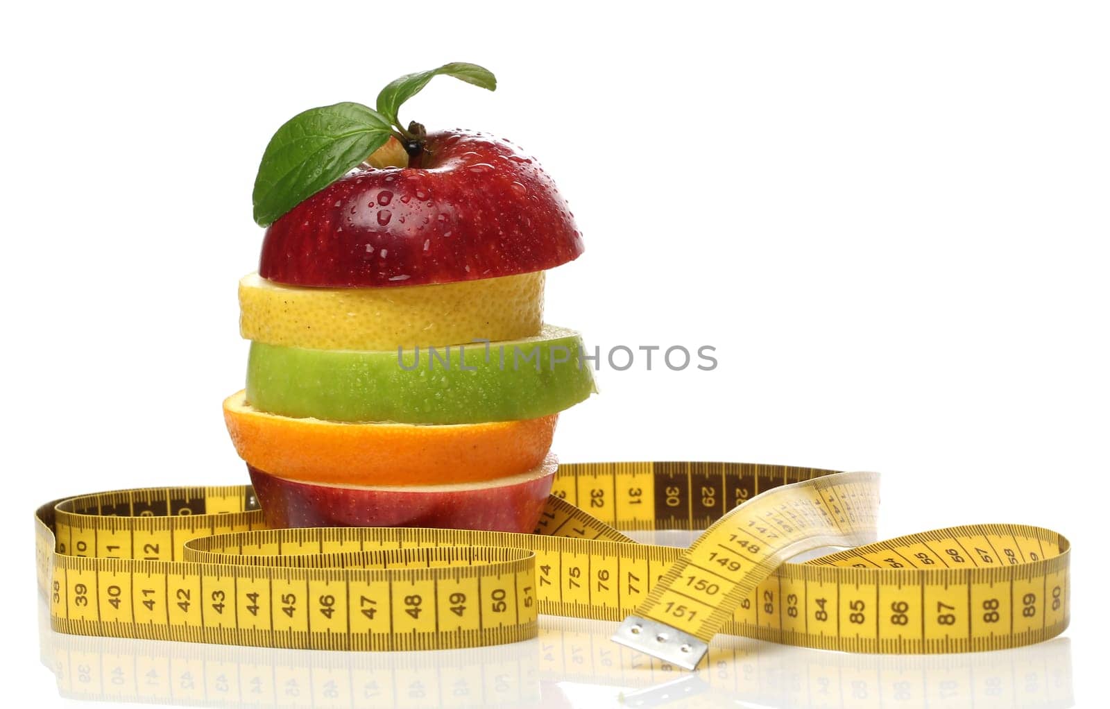 Colorful pile of fresh fruits over white