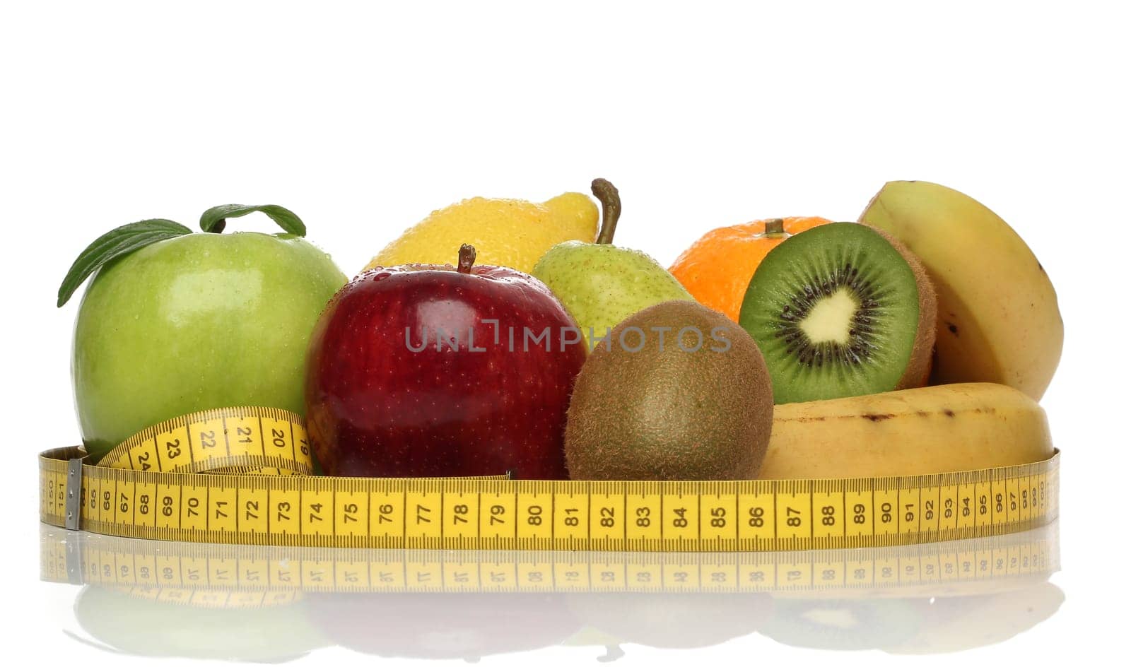 Delicious group of healthy fruits isolated on white