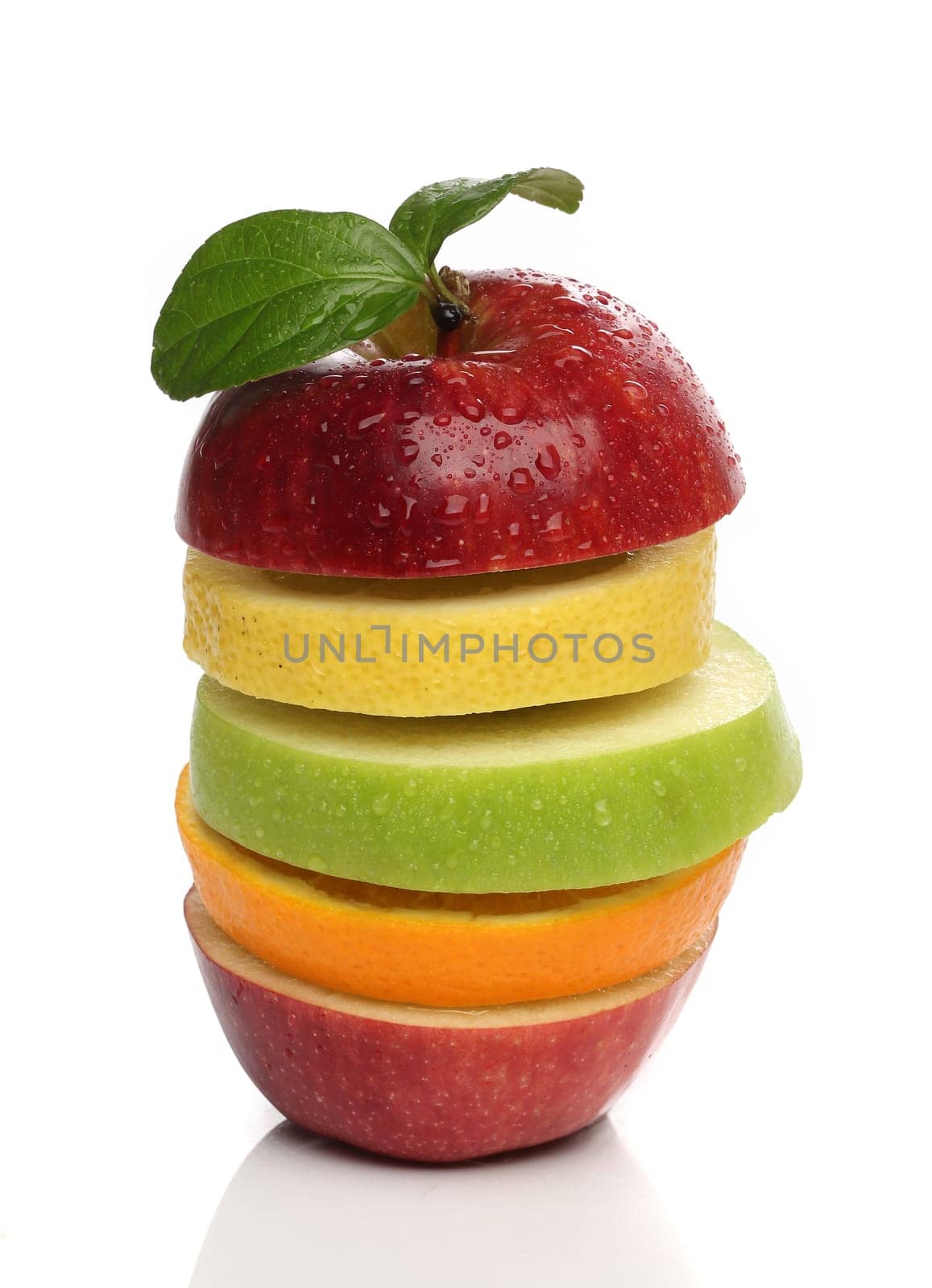 Colorful pile of fresh fruits over white