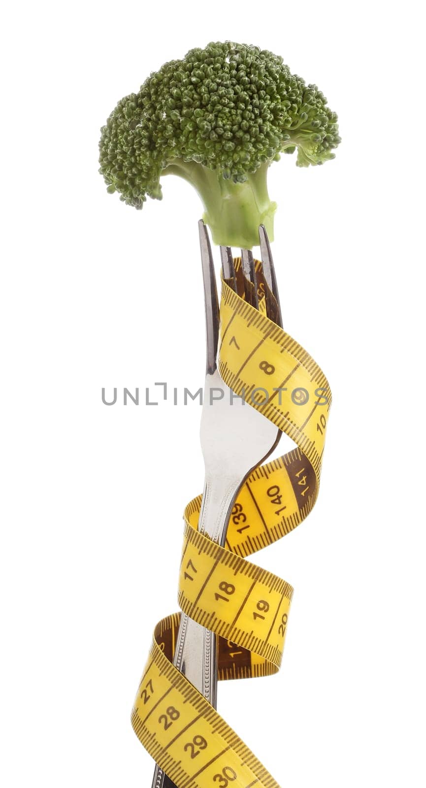 Fork with a broccoli isolated over white