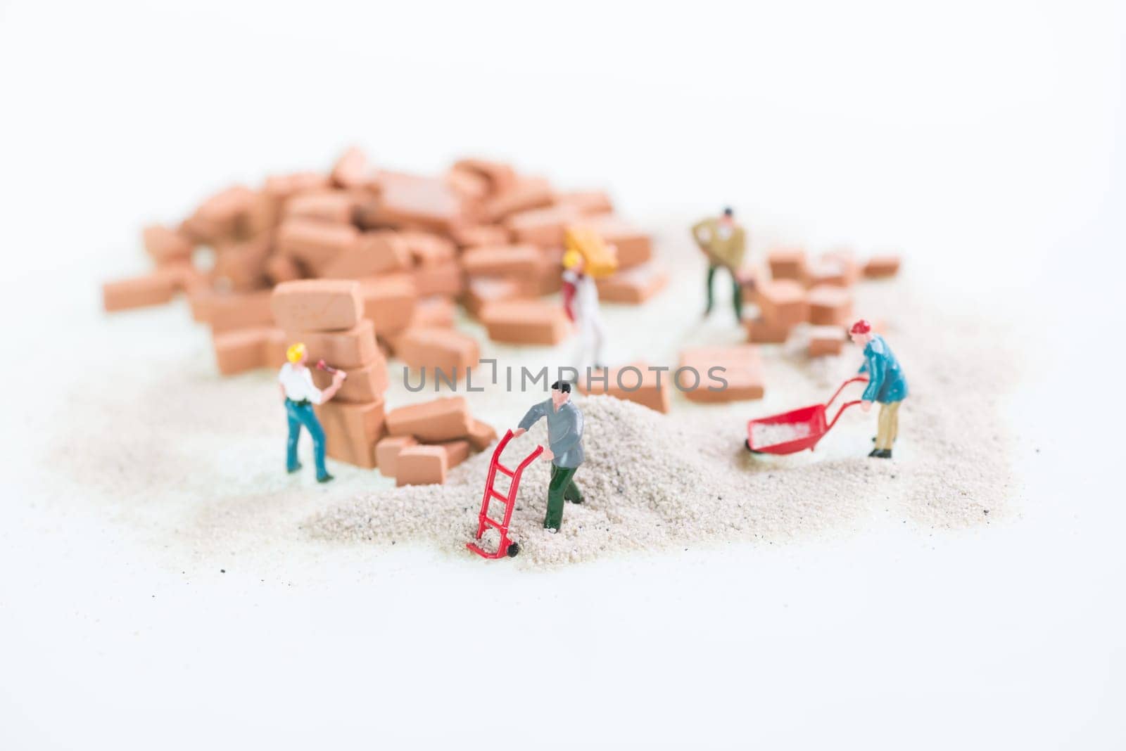 Miniature workmen doing contruction work