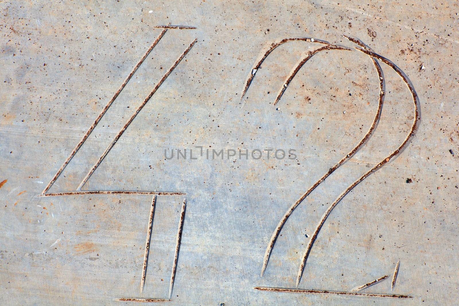Photo of Numbers forty-two etched in stone