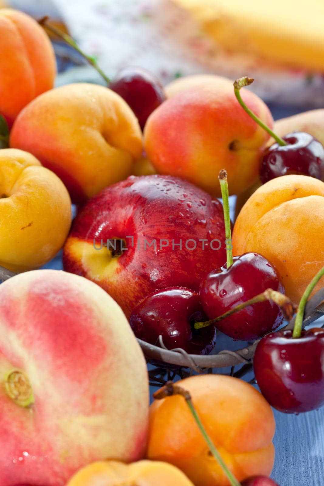 Different types of peaches,cherries and apricots in close-up