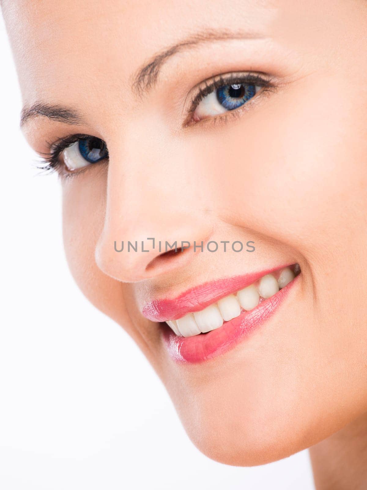 Beauty portrait of a young blonde woman, isolated on white background