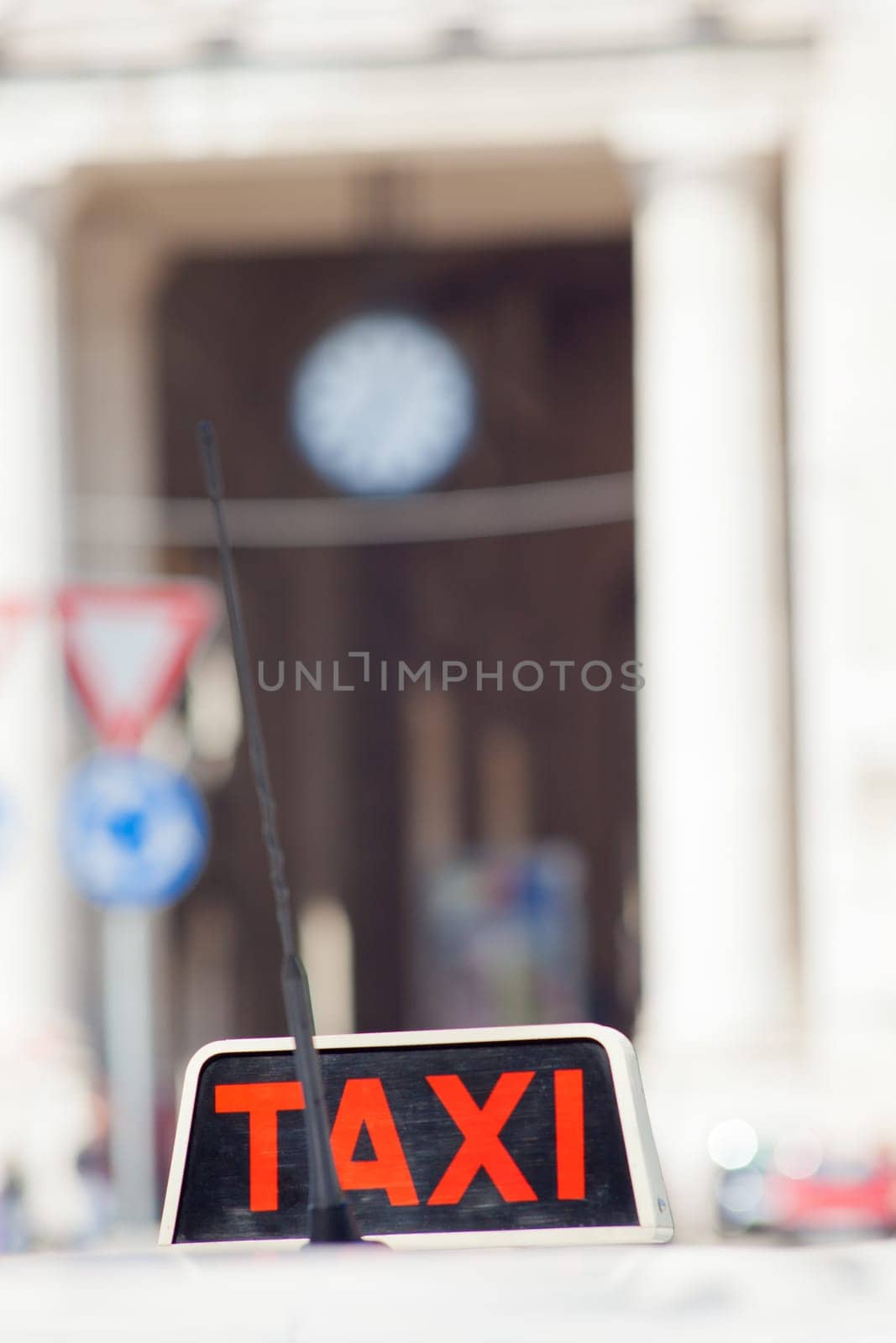 Detail of a white taxi in Milan