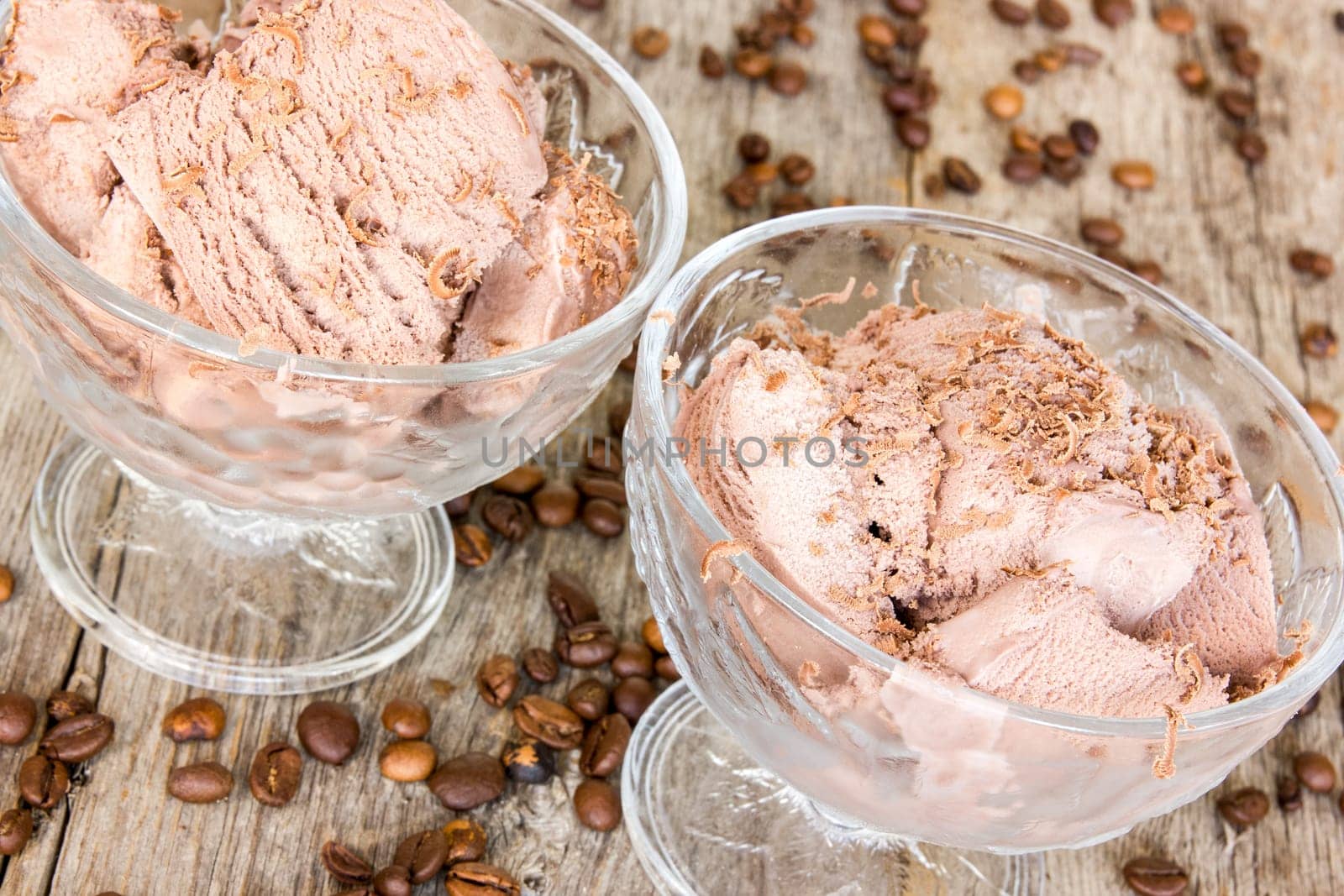 Glass bowl of chocolate ice cream with chocolate shavings