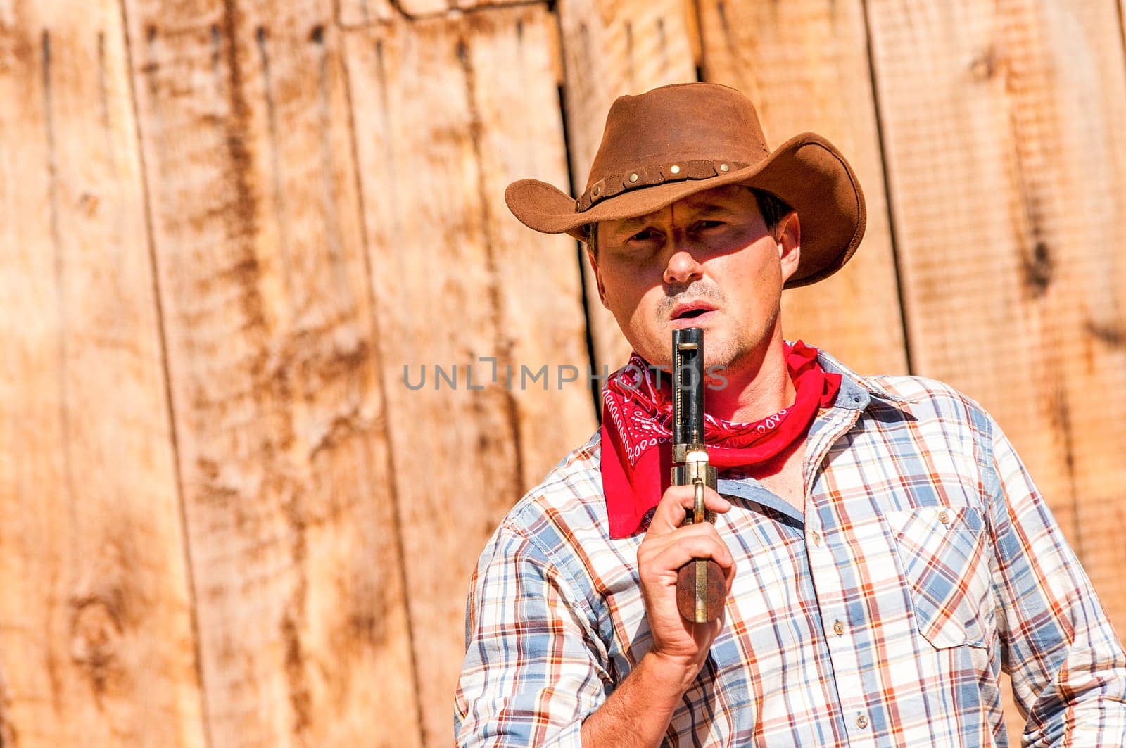SOUTH WEST - A cowboy takes time to rest and reflect.