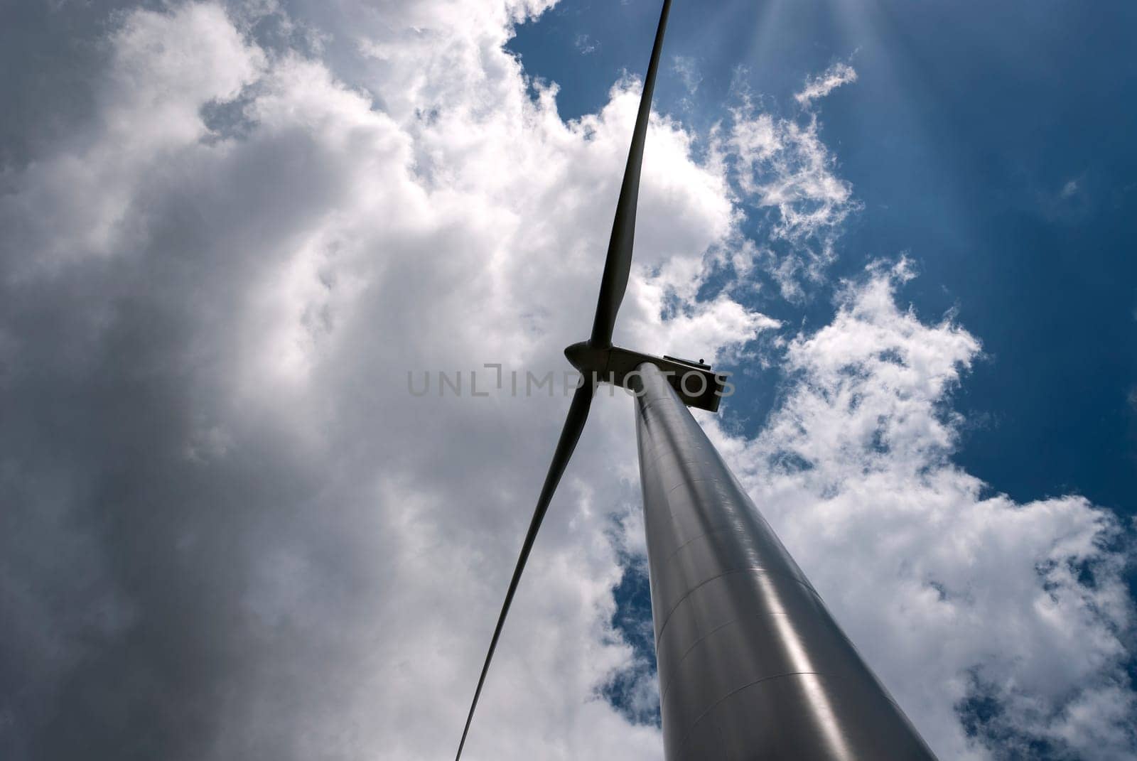 wind turbine with sky and clouds in Salerno